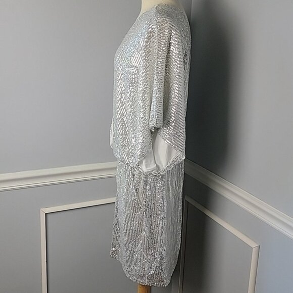 ELOQUII | Anthropologie Silver Sequin V-Neck Dolman Sleeve Holiday Party Romper - Picture 2 of 8